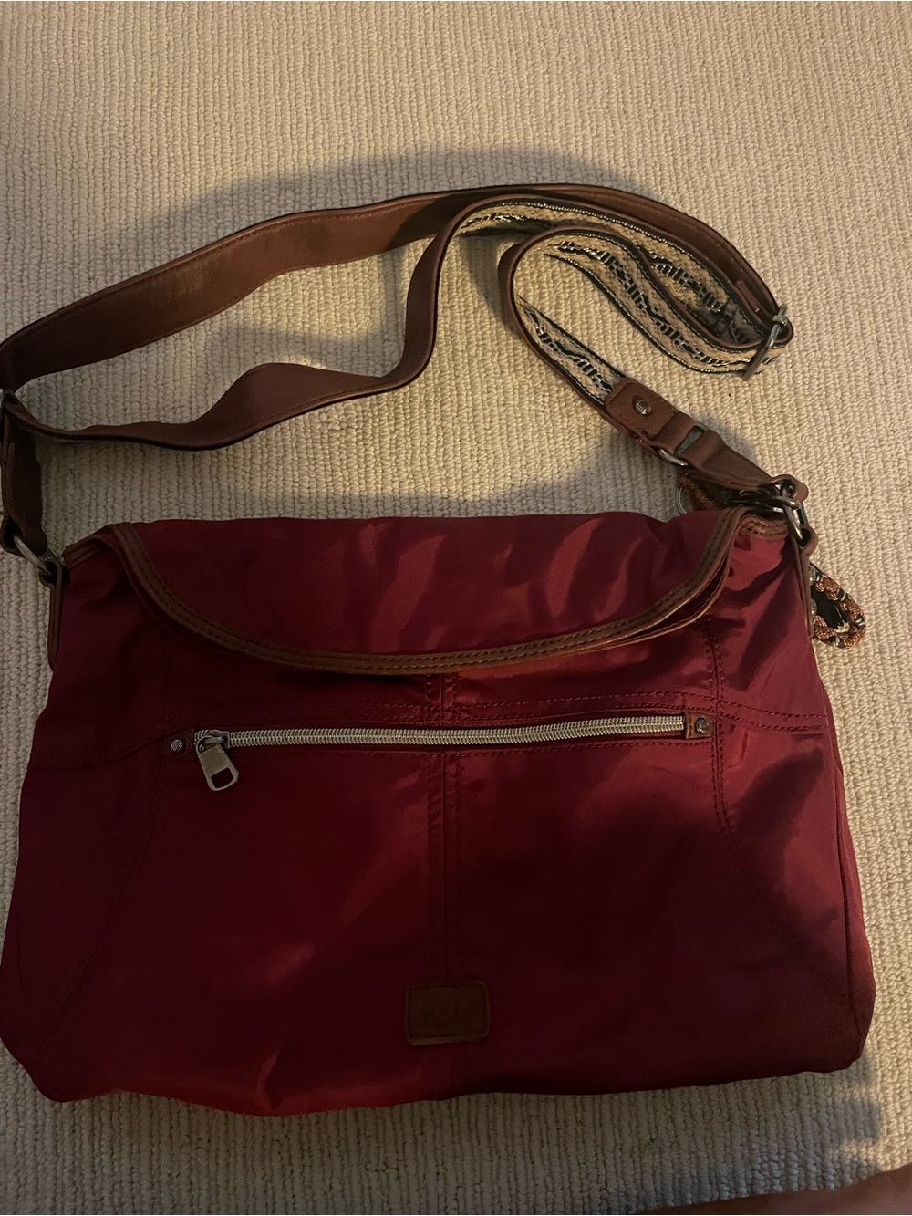 The Sak Maroon Crossbody Messenger Bag with Brown Trim b32